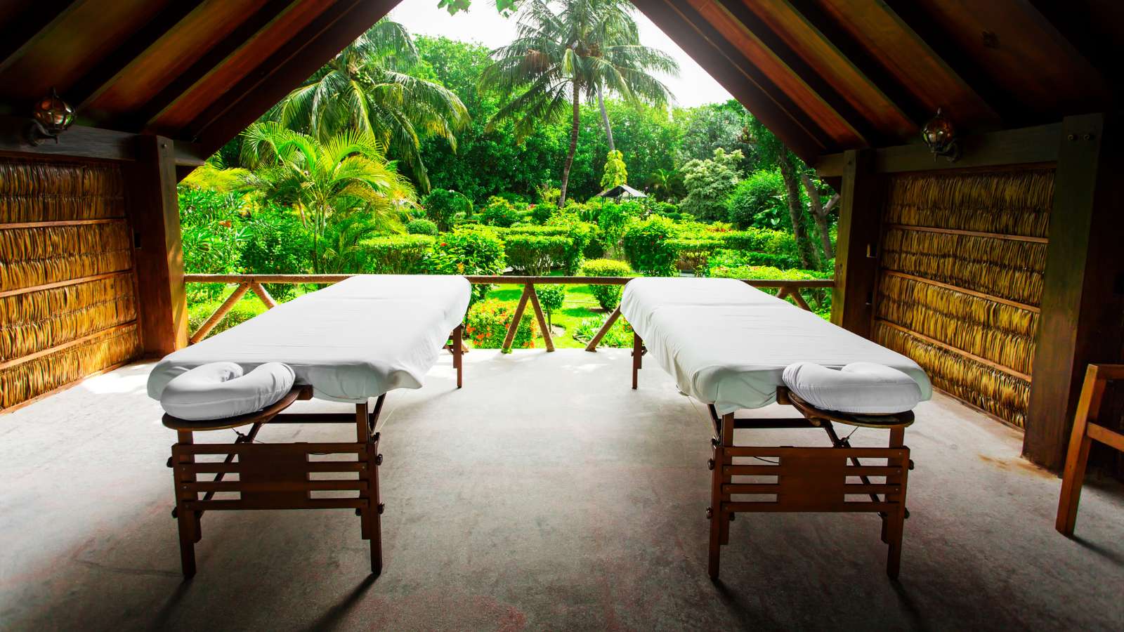 Spa beds ready to massage at outdoors tropical island resort