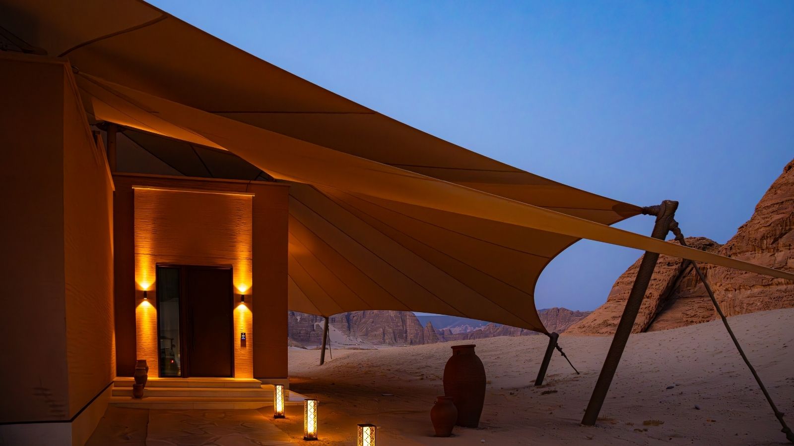 Sunrise at Banyan tree Hotel in AlUla, Saudi Arabia. building in the middle of desert.