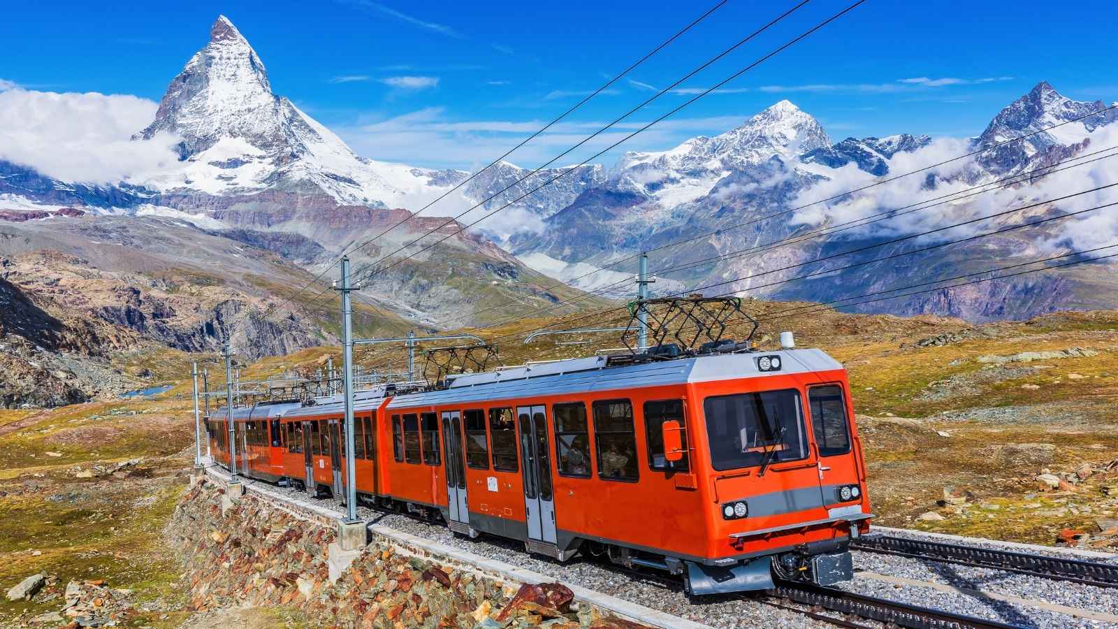 Zermatt, Switzerland. Gornergrat tourist train with Matterhorn peak in the background.