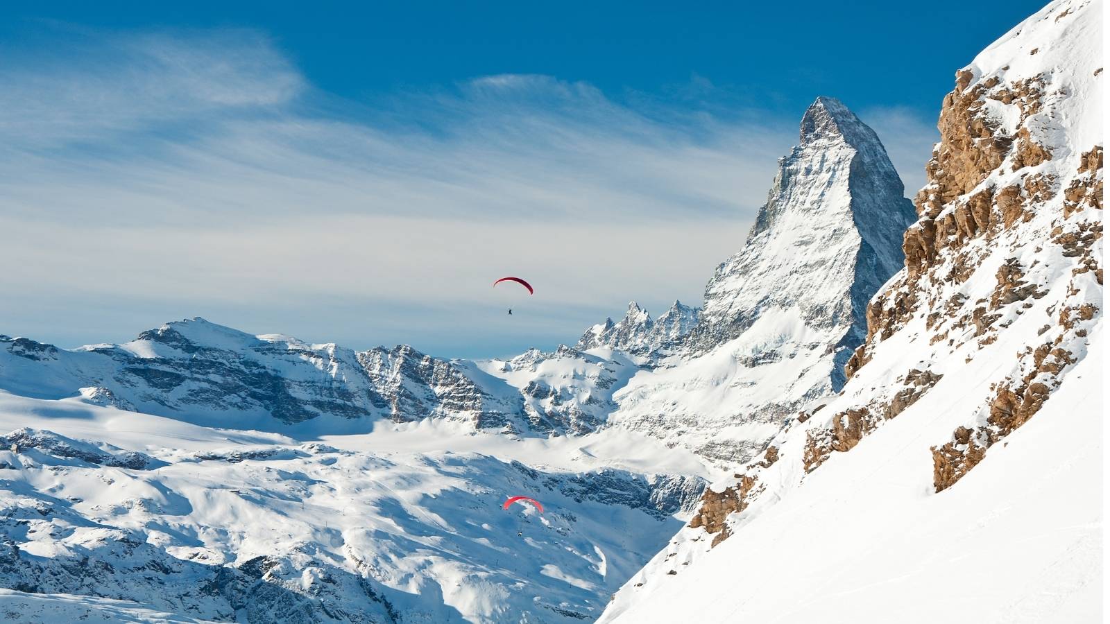 Paragliding over the Swiss Alps with Matterhorn in background