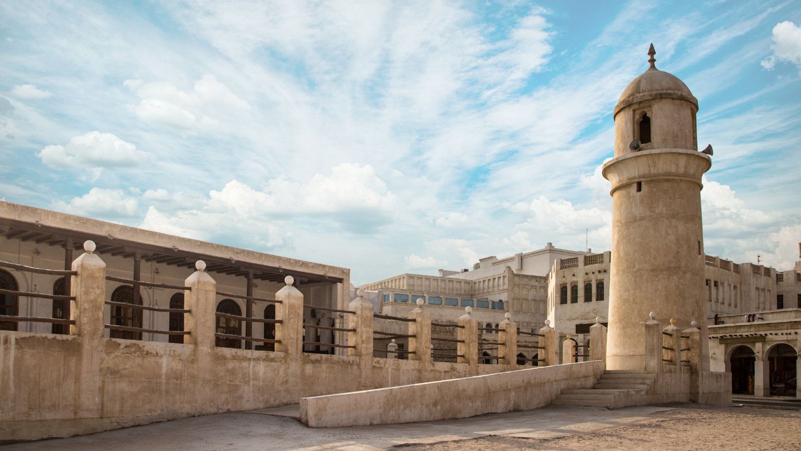 Old historic market and Al Ahmad Mosque in Doha. Islamic religion building, Souq Waqif