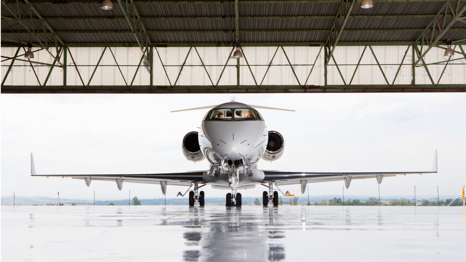 Private jet in aircraft hangar