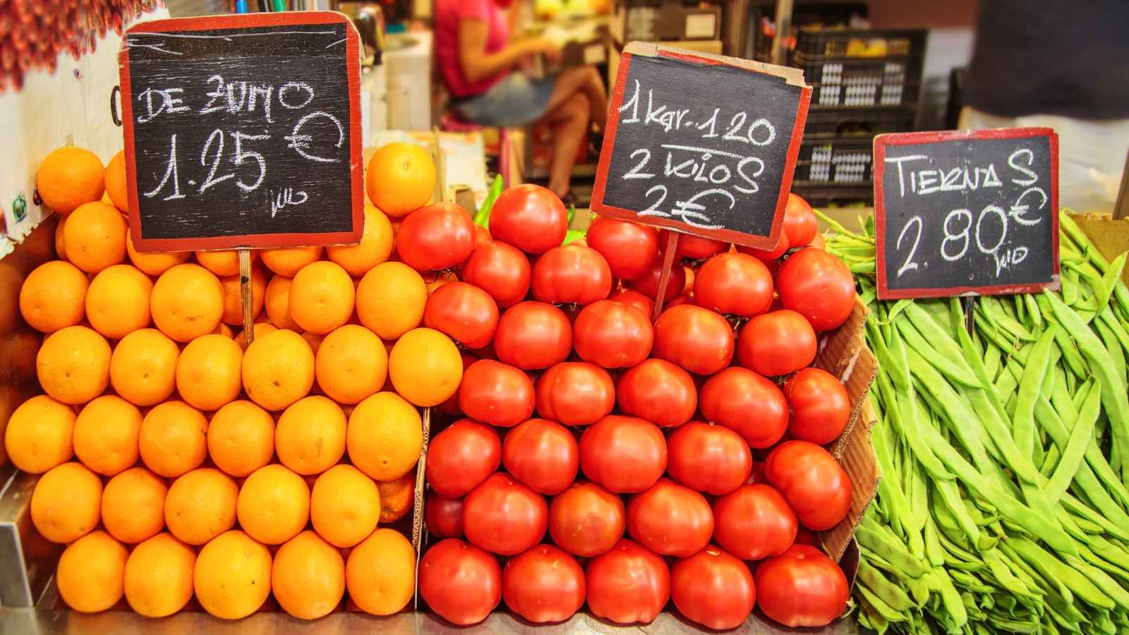 Fruit and vegetable stall in the indoor market of Mercado de Atarazanas