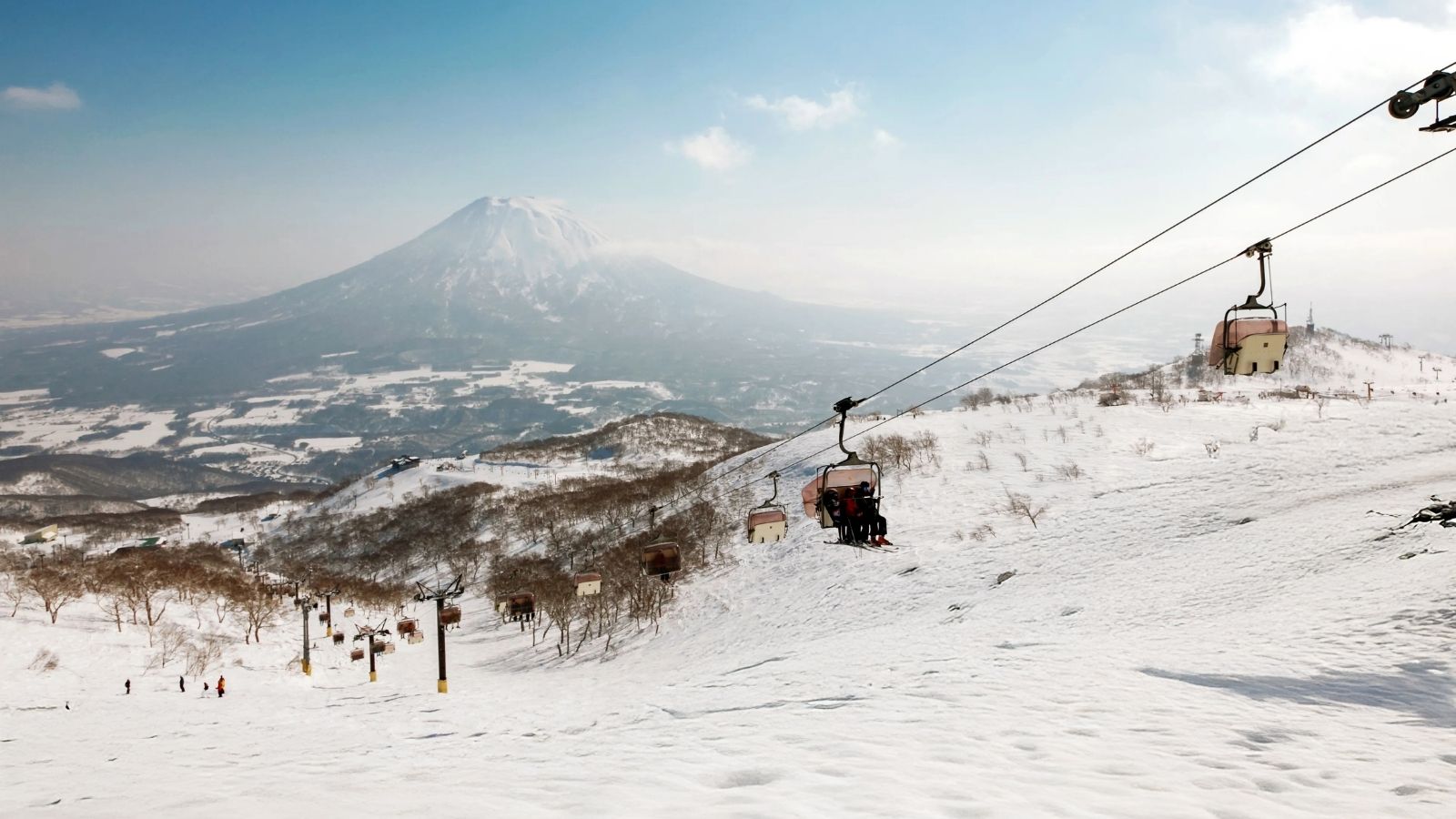 The ski lift at Niseko Village Ski resort in Hokkaido Japan on a clear sunny day