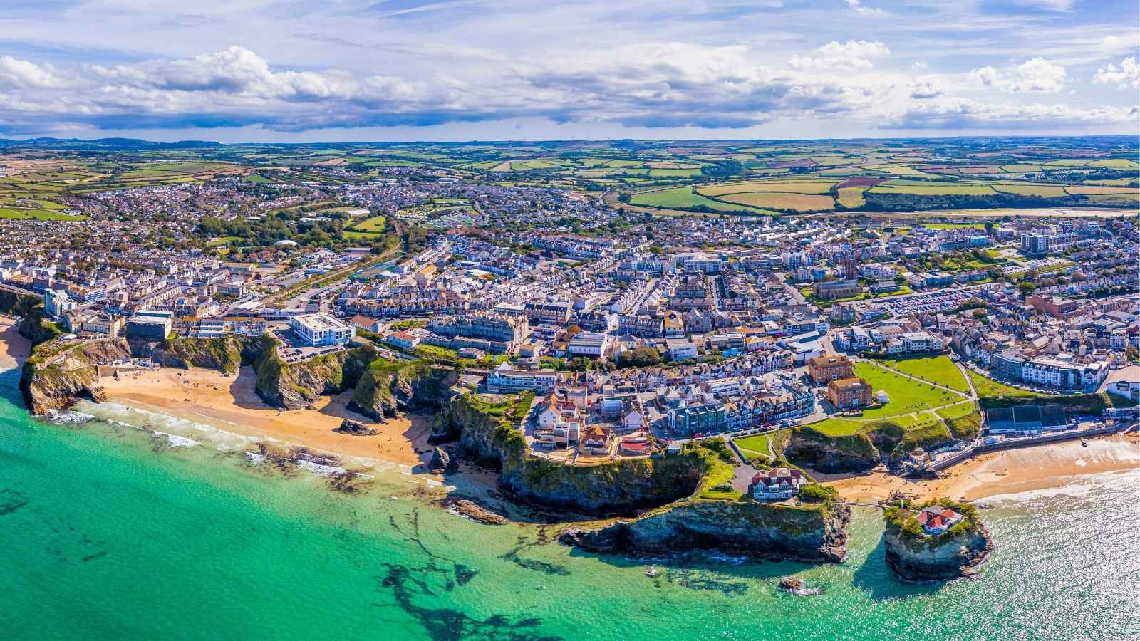 Aerial view over the sandy beaches of Newquay, Cornwall, England